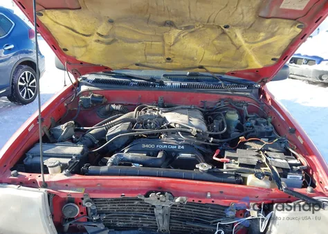 1999 Toyota Tacoma из США, поврежденный, VIN 4TAWN72N2XZ518657